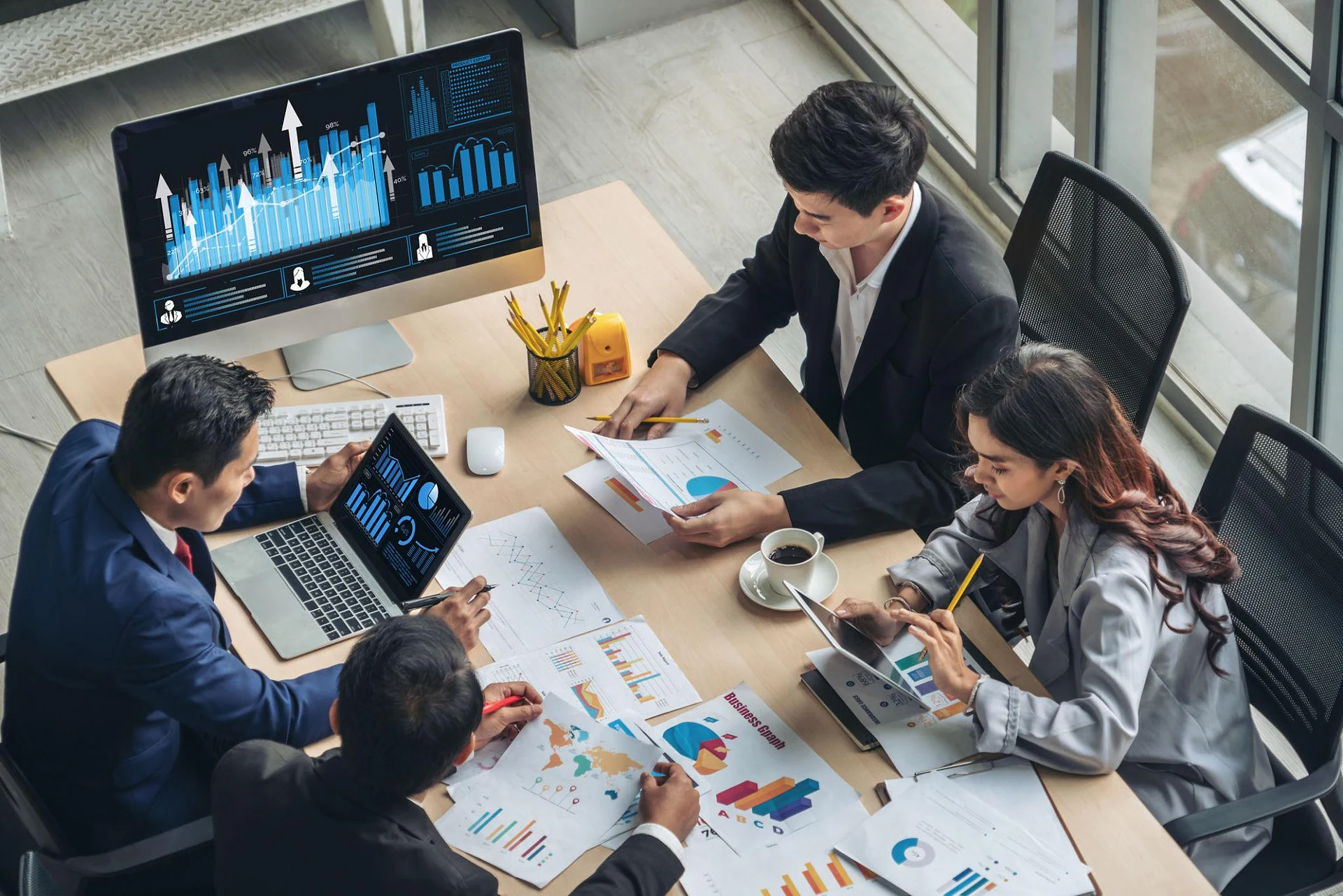Business team using AI tools during hands-on AI learning session