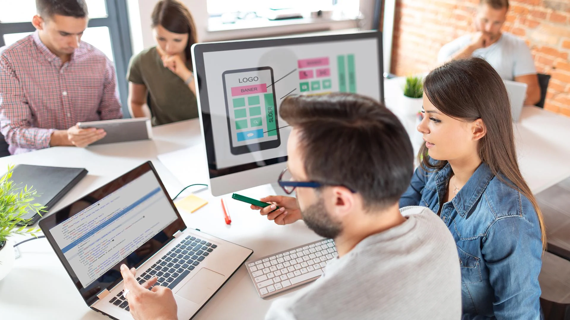 Web development team working on website design, coding, and modern web technologies